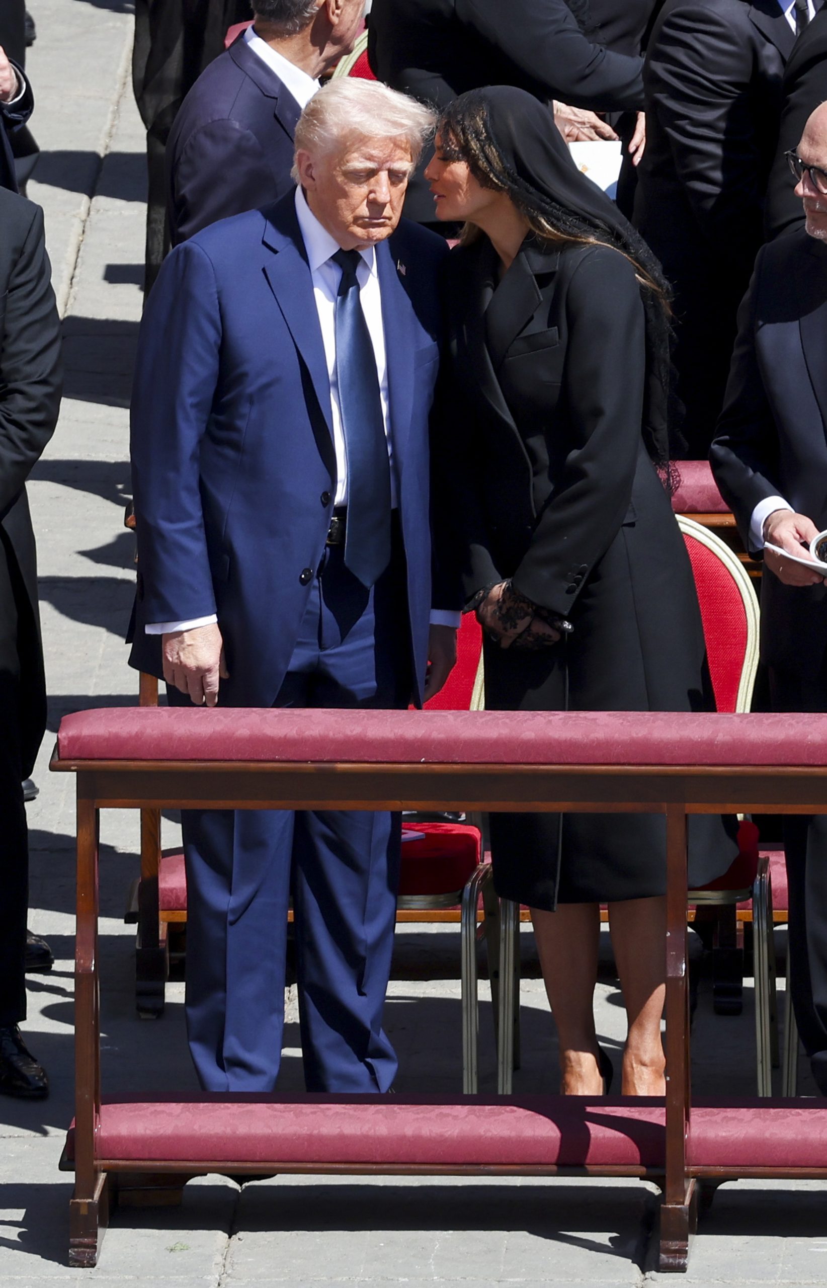 Melania Trump whispers to President Donald Trump at Pope Francis' funeral | Source: Getty Images
