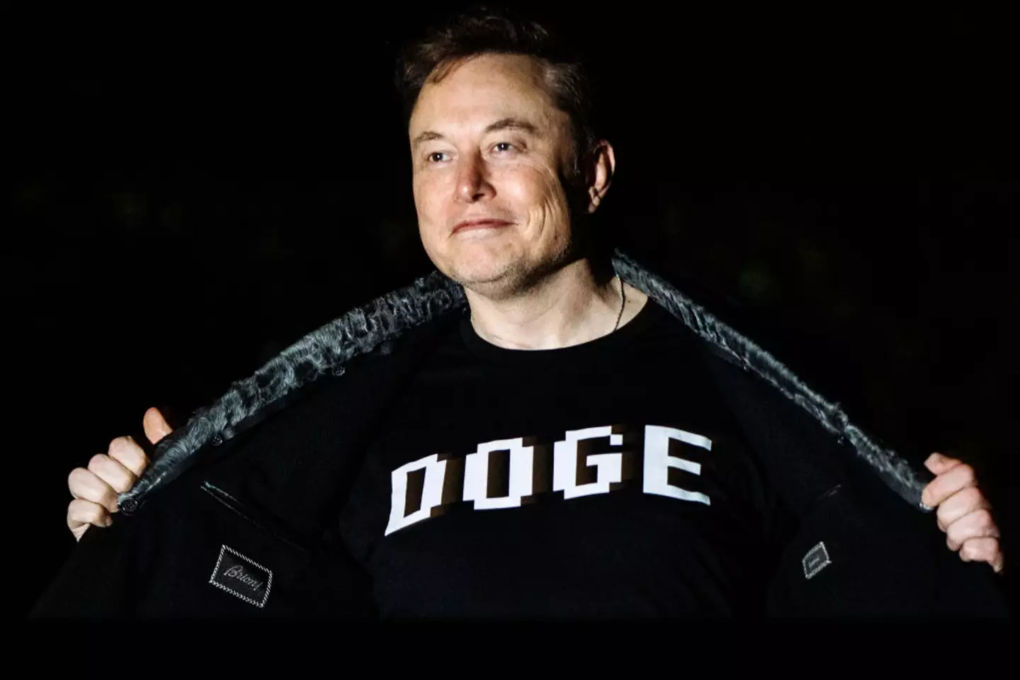 Elon Musk seen sporting a 'DOGE' t-shirt in March (Samuel Corum/Getty Images)
