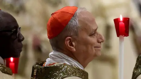 Getty Images US cardinal Robert Francis Prevost attends the Easter Vigil Mass at St. Peter's Basilica on April 19, 2025