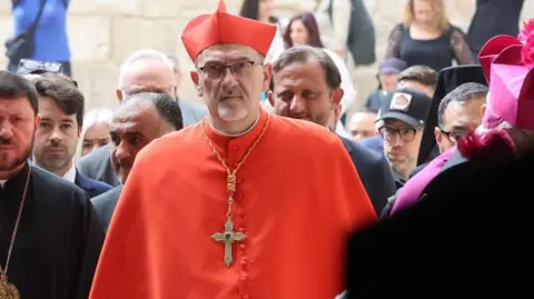 EPA The Latin Patriarch of Jerusalem Pierbattista Pizzaballa leads a special mass prayer in memory of late Pope Francis at the church of the Holy Sepulchre in the Old City of Jerusalem, 23 April